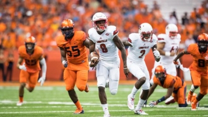 Jackson leads 13th-ranked Cards past Syracuse, 62-28