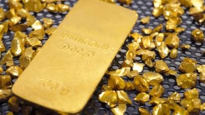 Gold inches up on weaker dollar, European Central Bank stimulus in focus