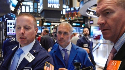 Soothing Fed lifts stocks, Wall St eyes record highs