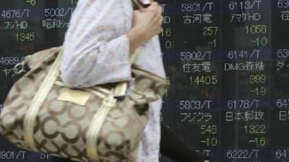 Stocks rise after Bank of Japan move, ahead of Fed