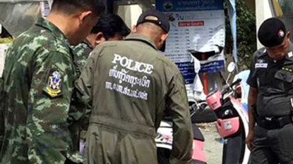 Thai police raid on suspected foreign forgery gang uncovers body in freezer