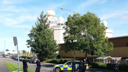 UK police make arrests after armed men occupy Sikh temple