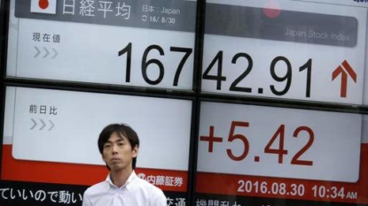 Tokyo shares open mixed