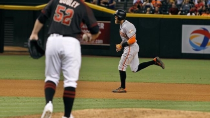 Tomlinson, Giants outlast Diamondbacks 7-6 in 12 innings