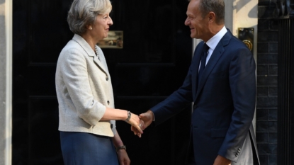 EU’s Tusk urges May to begin formal Brexit talks