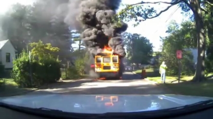 Baltimore school bus goes up in flames with 20 kids on board