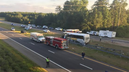 Charter bus carrying football team crashes into bridge; fatalities reported