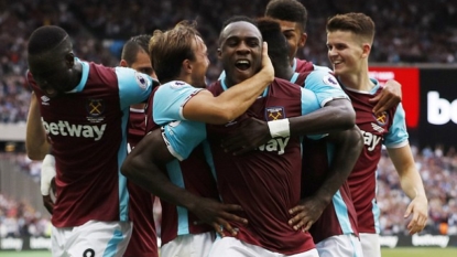 Fighting breaks out between West Ham fans during Watford match