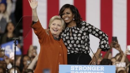 Boosting Clinton, Obama aims to build up Democratic Party