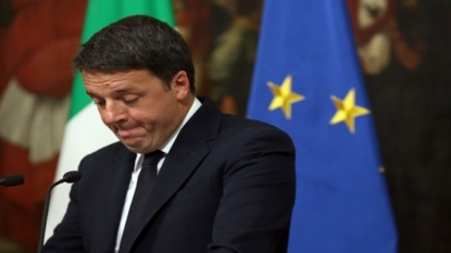 Italy’s Renzi asked to stay on as caretaker PM