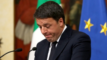 Euro falls as Italian leader quits after losing reform vote