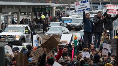 11 men held at JFK, one other released following Trump travel ban