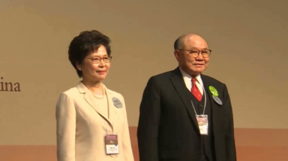 Carrie Lam vows to unite Hong Kong after winning polls