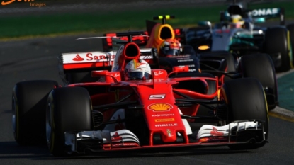 Hamilton fights off Vettel to grab pole