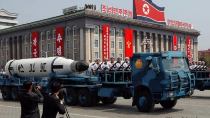 North Korea rolls out missiles, other weaponry at parade