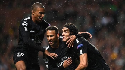 Pitch-invader aims kick at PSG star Kylian Mbappe