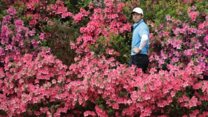 Reed charges into Masters lead with second-round 66