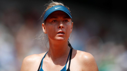 Halep stops Muguruza to reach third French open final